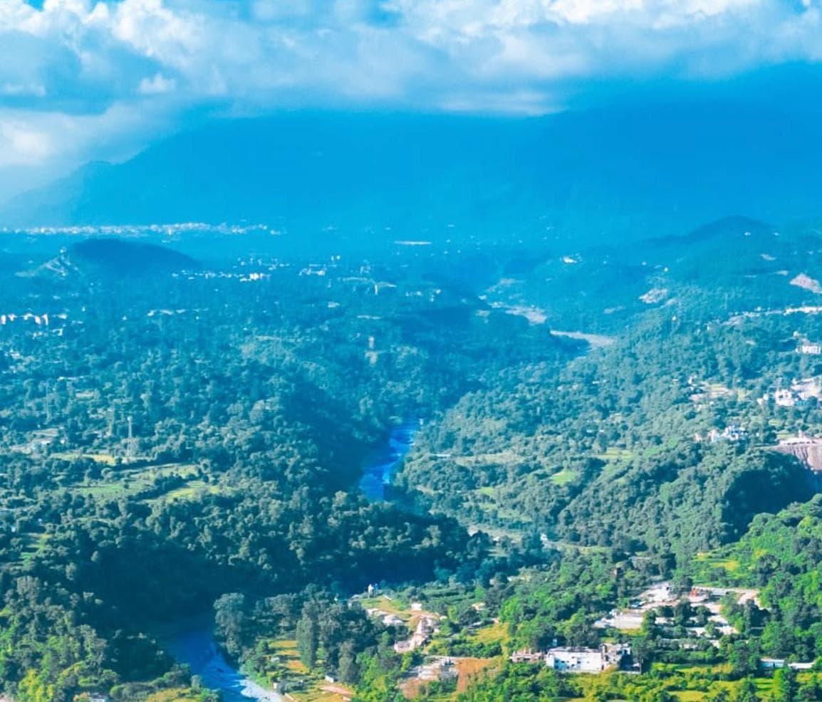 Aerial view of the Utangan River flowing through dense forest
