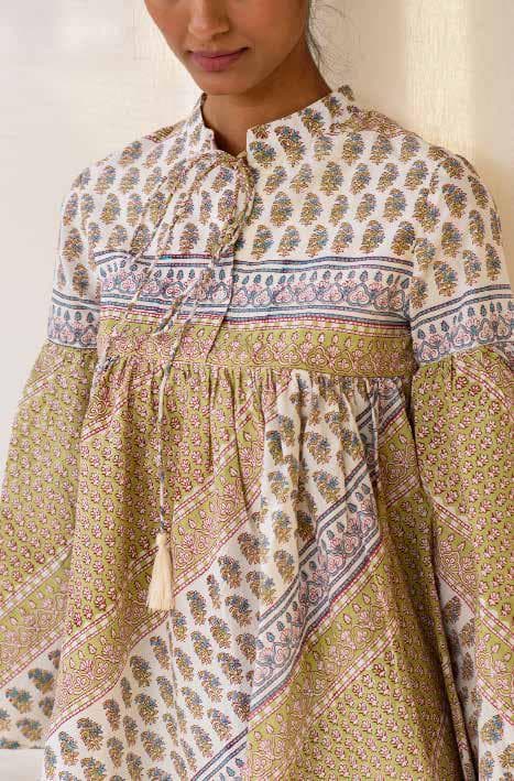 Short Tie Neck Top With Lower Bias Cut Panel.