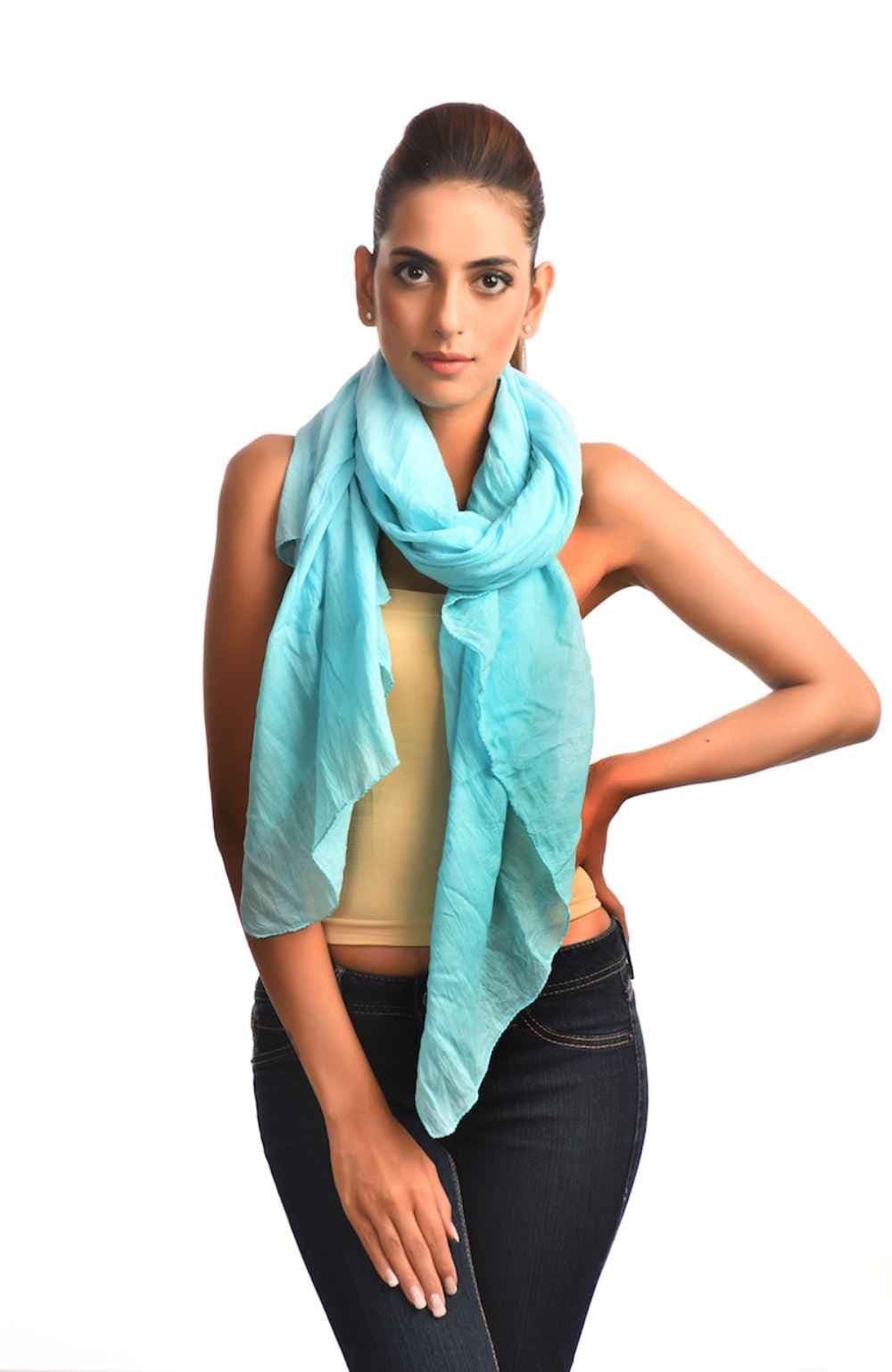 TURQUOISE COLOR SOLID DYED COTTON SCARF.