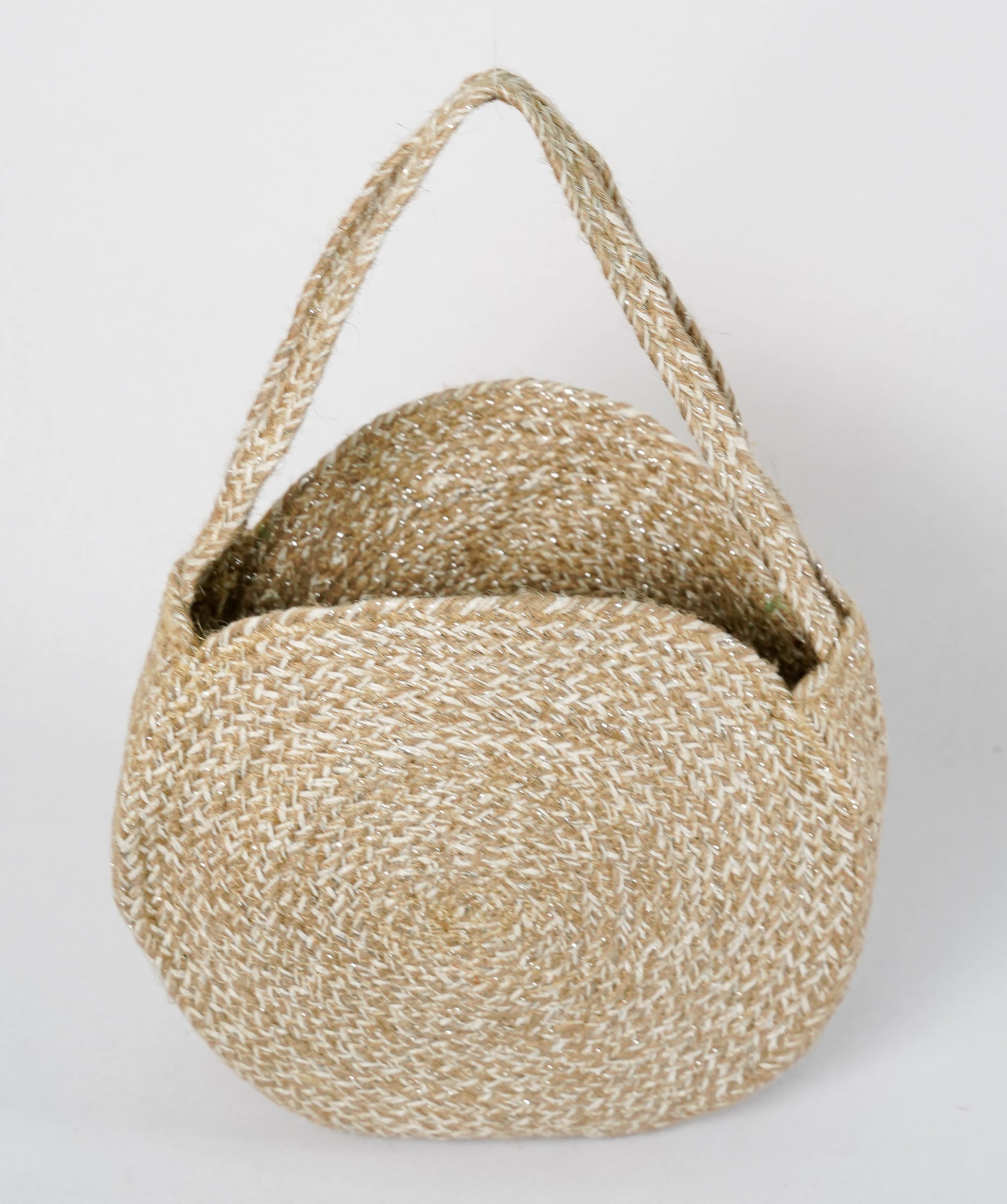 WHITE AND NATURAL BRAIDED ROUND JUTE BAG