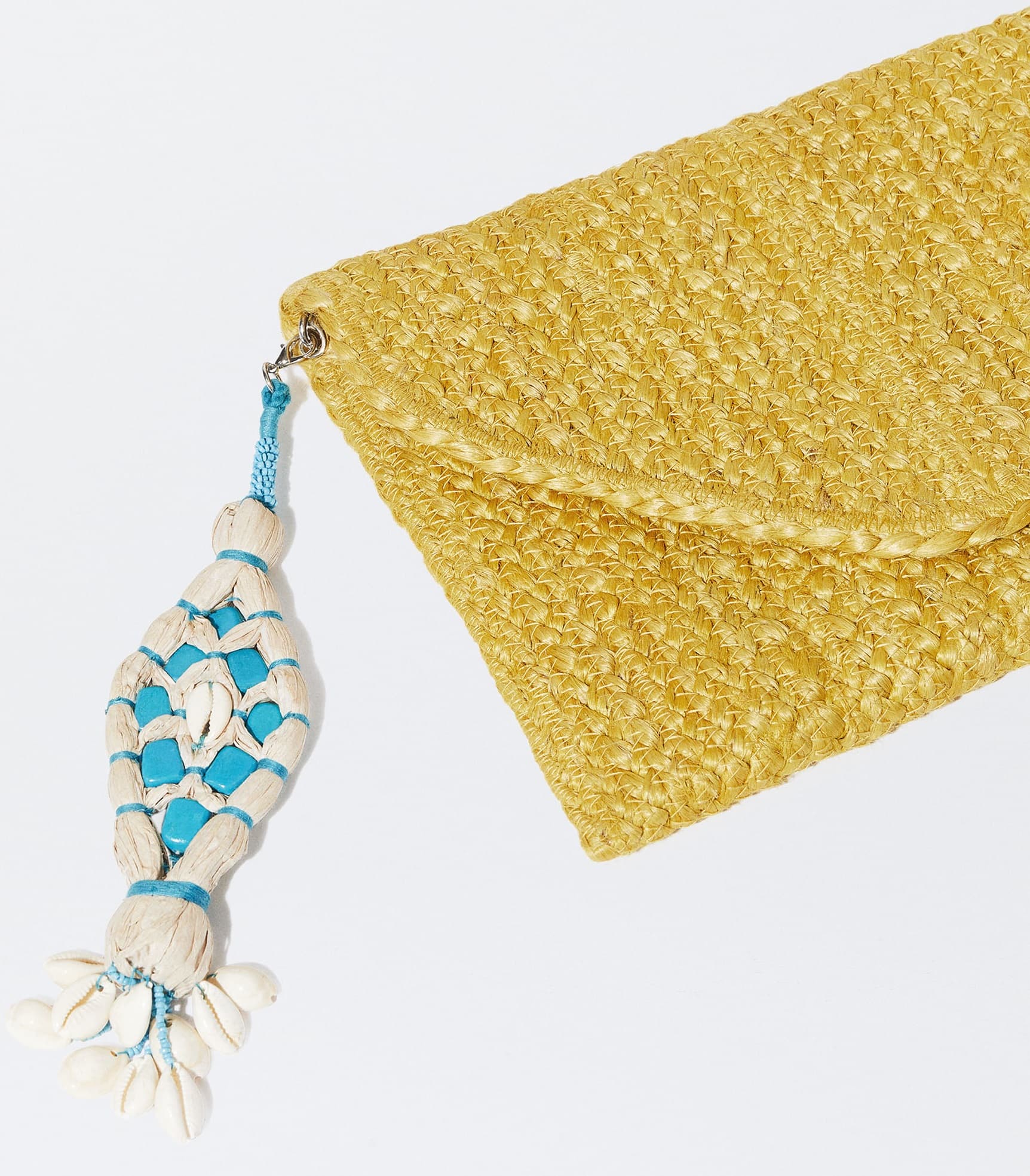 NATURAL BRAIDED JUTE ENVELOPE CLUTCH WITH RAFFIA PENDENT