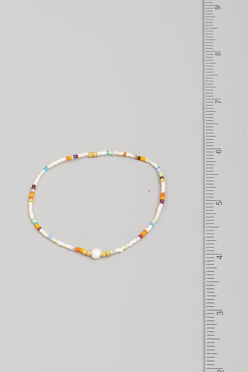 WHTE MULTI BEADED STRETCH BRACELET