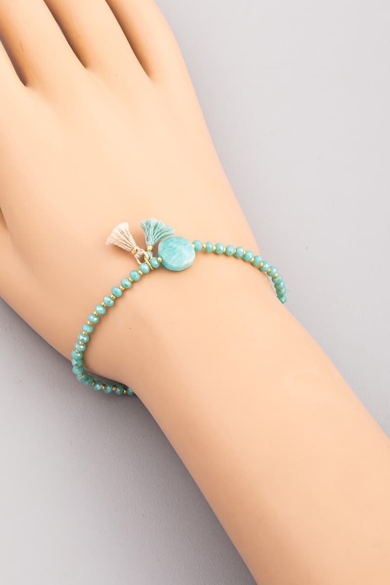 GLASS STONE AND TASSEL STRETCH BRACELET
