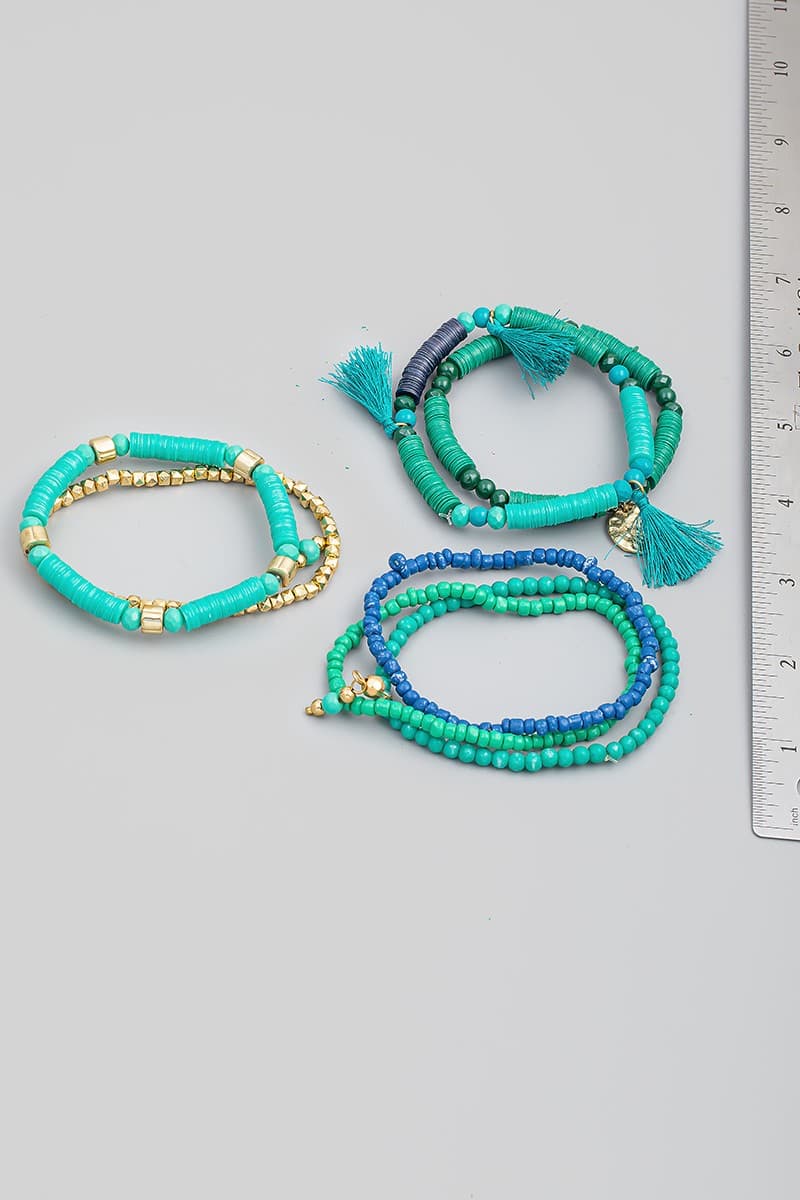 TURQ MULTI ROW STRETCH BRACELET WITH TASSEL