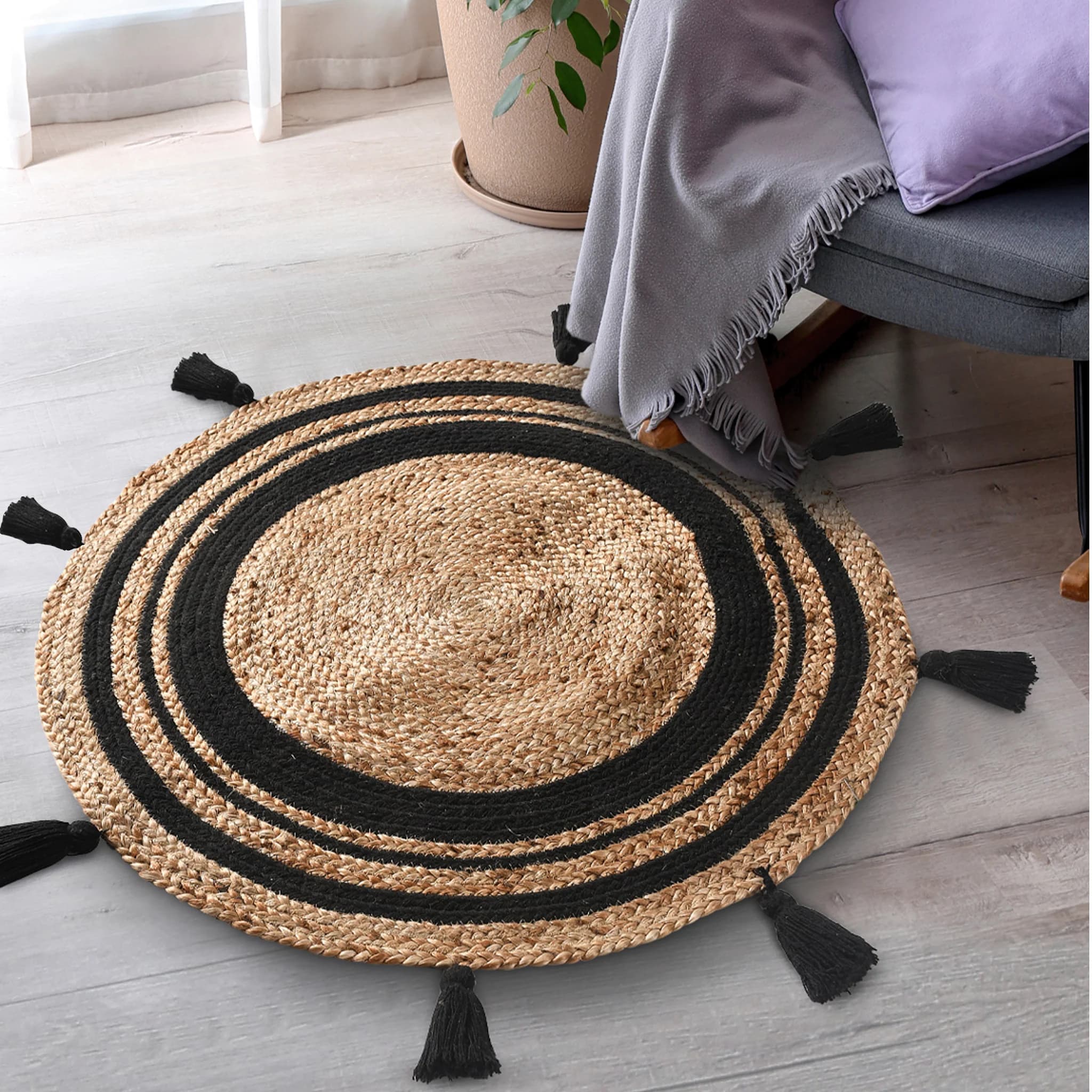 ROUND COTTON AND JUTE WOVEN RUG WITH TASSELS