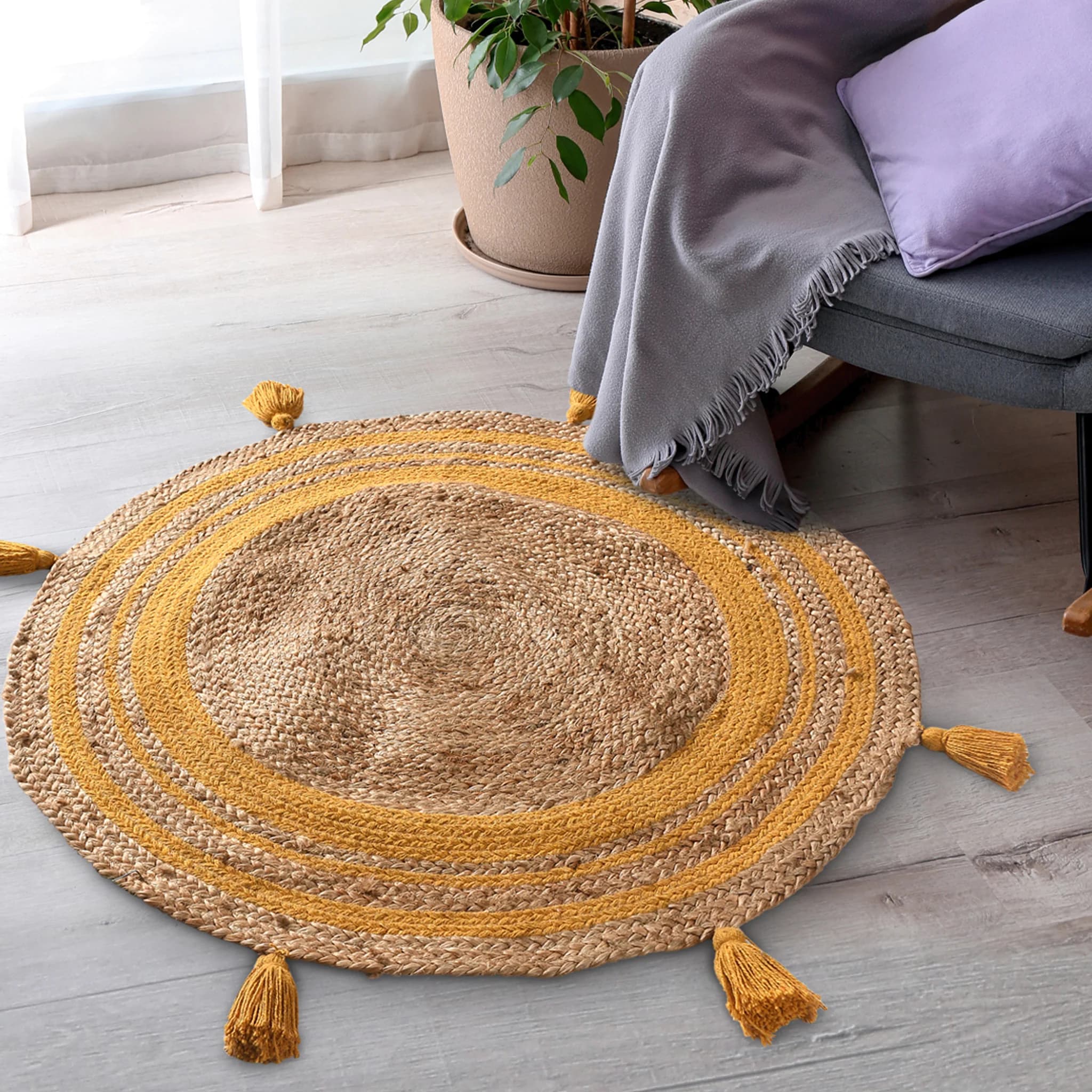 ROUND COTTON AND JUTE WOVEN RUG WITH TASSELS