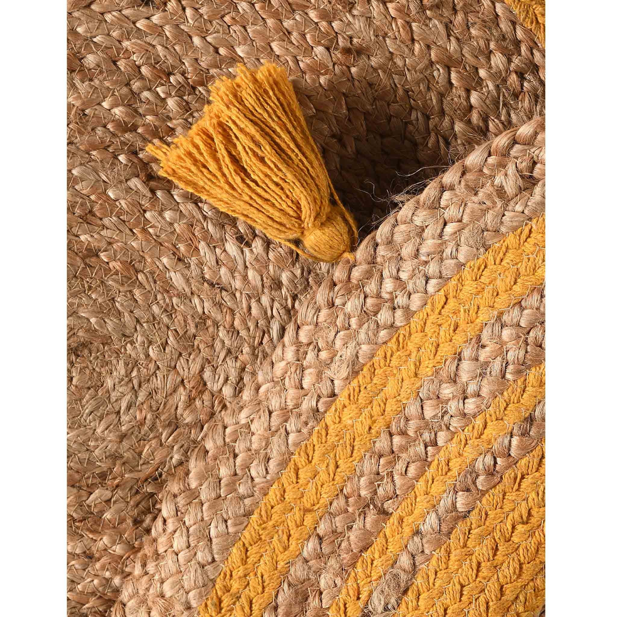 ROUND COTTON AND JUTE WOVEN RUG WITH TASSELS
