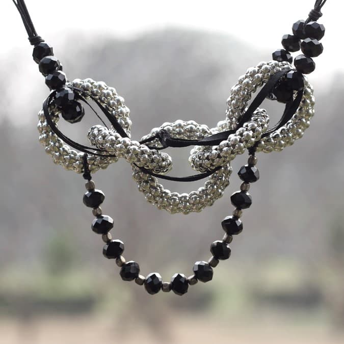 BLACK SILVER STONE WITH CORD DESIGN NECKLACE